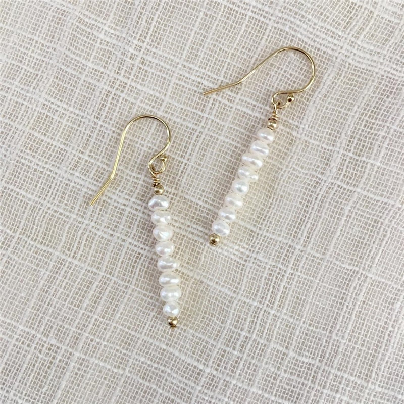 14K tiny pearl pierce