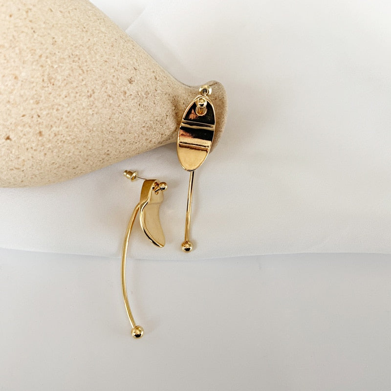 Gold metal stud pierce