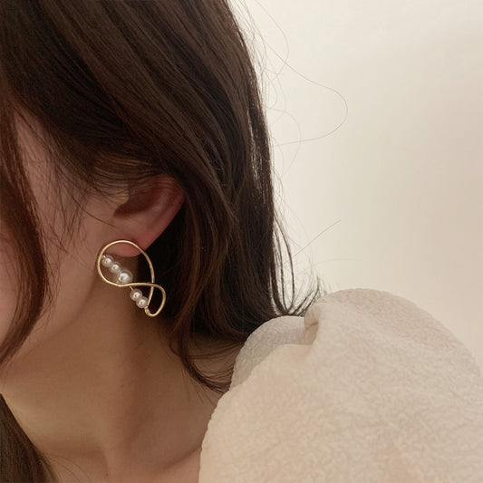 Twisted pearl pierce