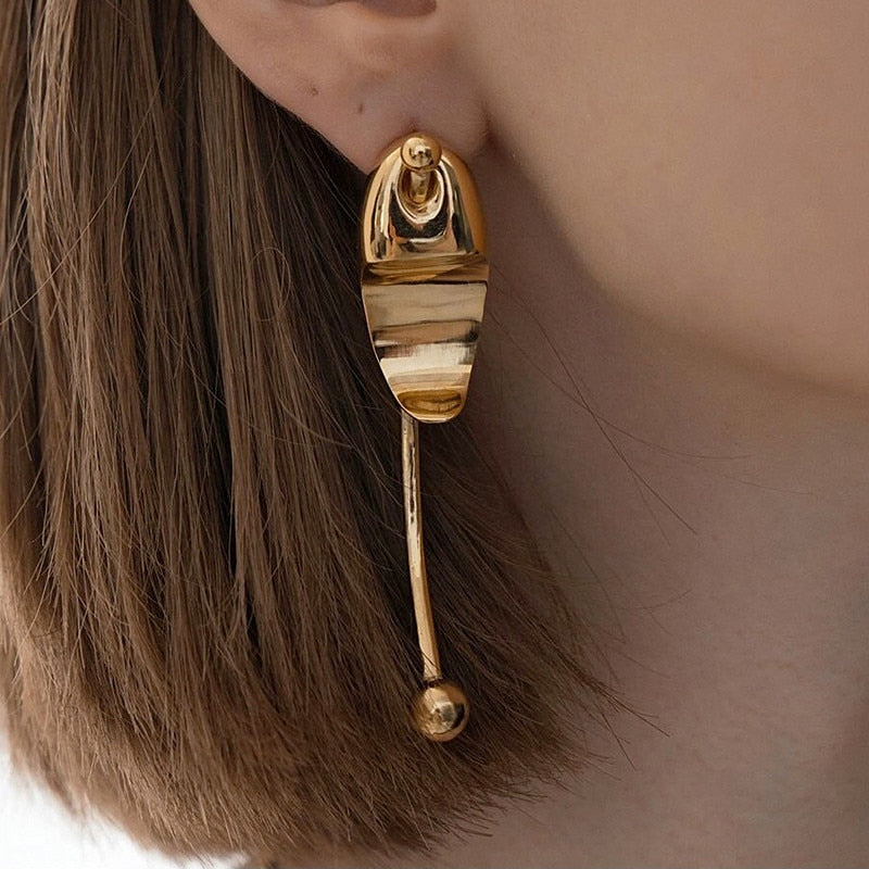 Gold metal stud pierce